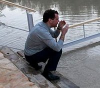 В праздник Крещения Дмитрий Медведев совершил омовение в священных водах реки Иордан