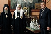 Глава Республики Калмыкия А.М. Орлов и епископ Элистинский Зиновий представили Святейшему Патриарху Кириллу проект кафедрального собора в Элисте