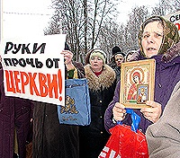 Глава пресс-службы Украинской Православной Церкви обвиняет власти Украины в поддержке раскольников при передаче храмов